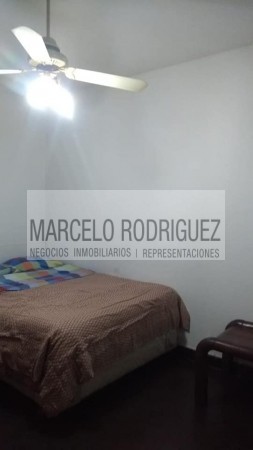 CASA CON OFICINAS