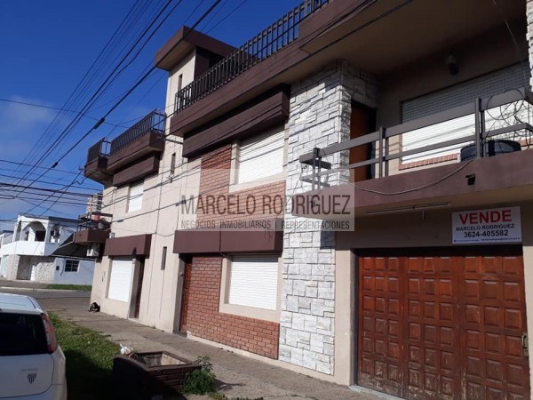 CASA CON OFICINAS