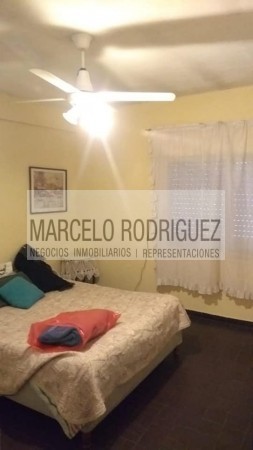 CASA CON OFICINAS