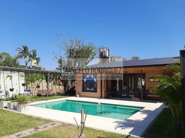 CASA CON QUINCHO Y PISCINA